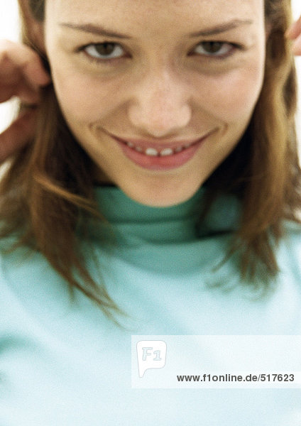 Woman smiling at camera  close up portrait