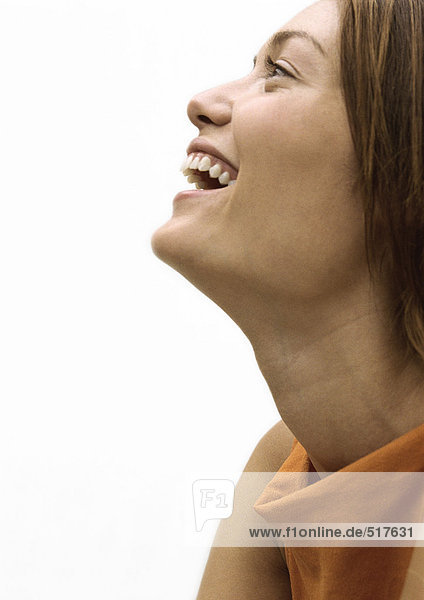 Woman laughing  profile portrait