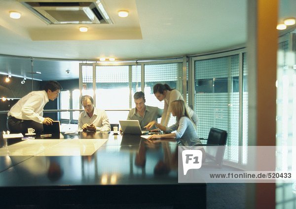 Businesspeople working in conference room