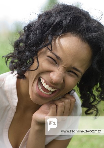 Young woman laughing  portrait