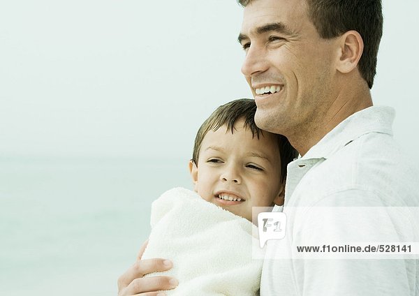 Father and son at the beach  portrait