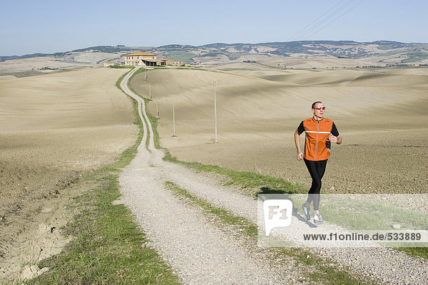 Italy  Tuscany  man jogging