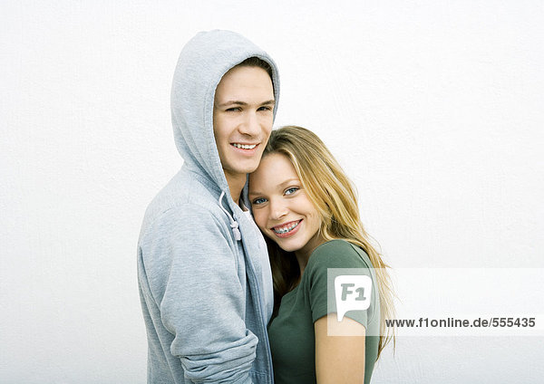Young couple  woman leaning head on man's shoulder