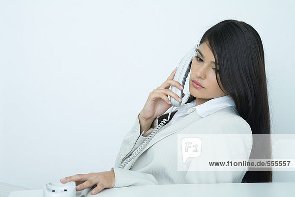 Businesswoman using phone