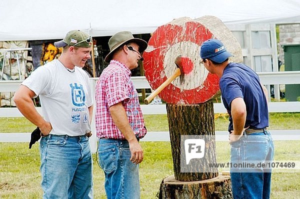 Loggers give demonstration of lumber jack games at fair