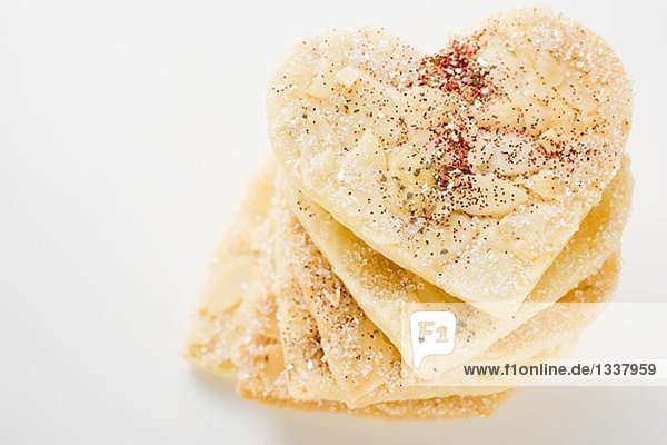 Almond hearts with sugar in a pile