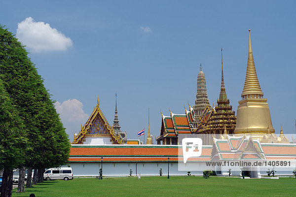 Stupa's in Buddhist temple against blue sky  Wat Phra Kaew  Bangkok  Thailand