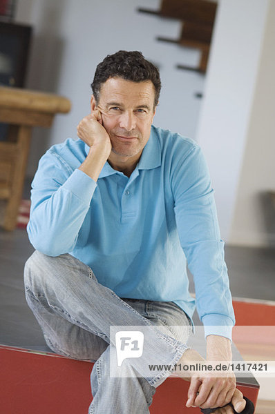 Man sitting  indoors