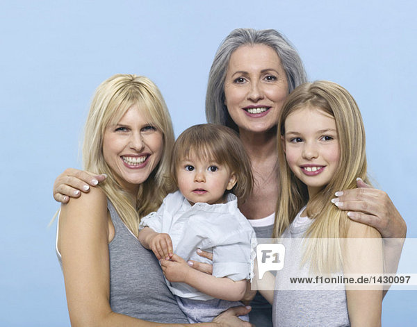 Senior woman with daughter and grand children  portrait