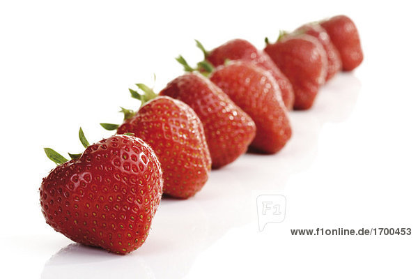 Erdbeeren in einer Reihe Nahaufnahme