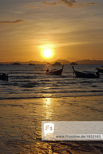 Boats in sea at dusk  Ao Nang  Thailand