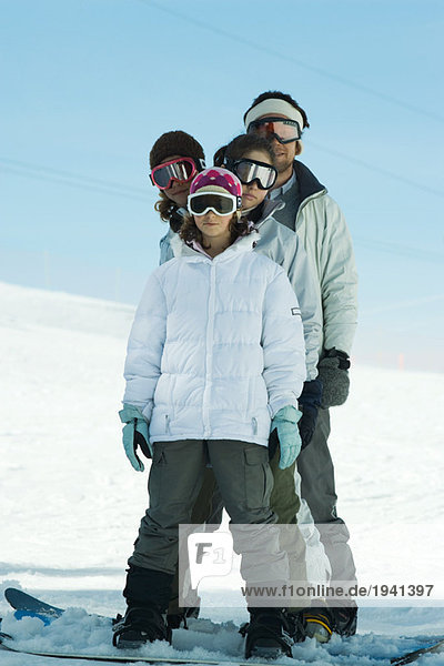 Group of young snowboarders  portrait