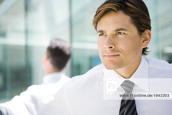 Businessman  looking out of frame  head and shoulders  portrait