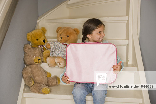 Young Girl playing Teddy bears
