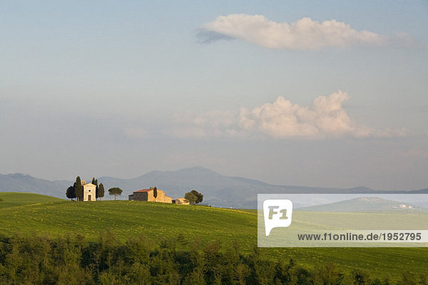 Italy  Tuscany  chapel and farm in landscape