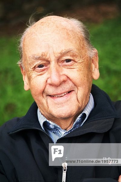 Portrait of smiling elderly man