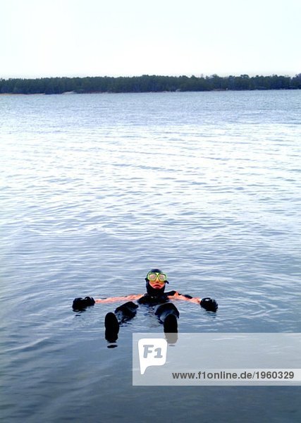 Diver floating