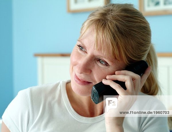 Blonde woman talking on the phone