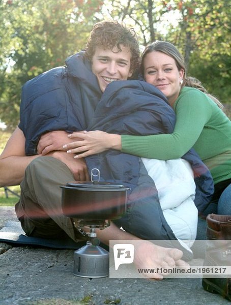 Couple having a good time camping
