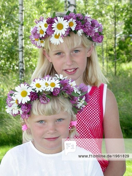 Two girls with flower in their hair