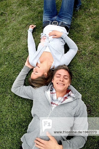 Girl and guy in grass