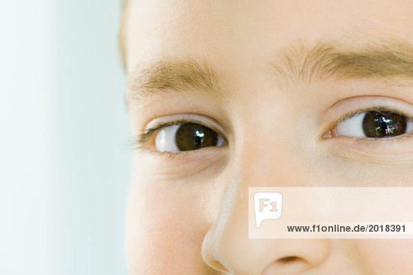 Extreme close-up of boy's eyes and nose