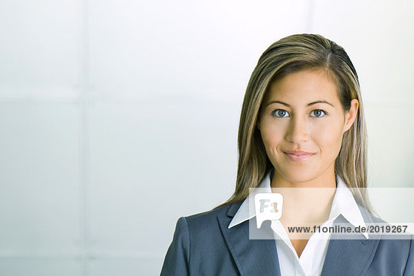 Businesswoman smiling at camera  portrait