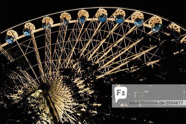 A Ferris wheel at night