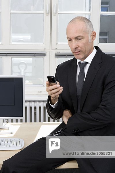 A businessman sitting on his desk