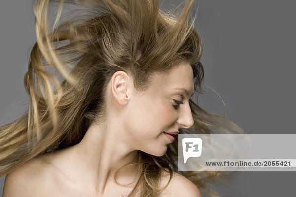 Air blowing through a fashion model's hair