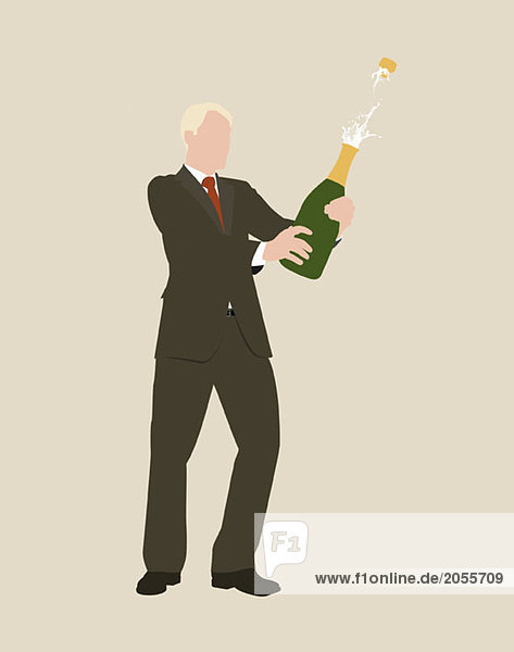 Ein Geschäftsmann  der mit Champagner feiert.