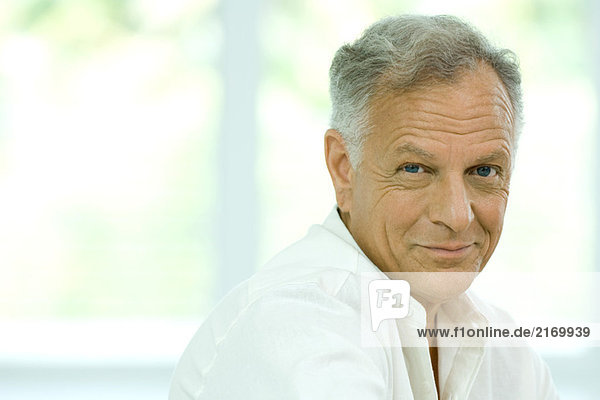 Mature man smiling at camera  portrait