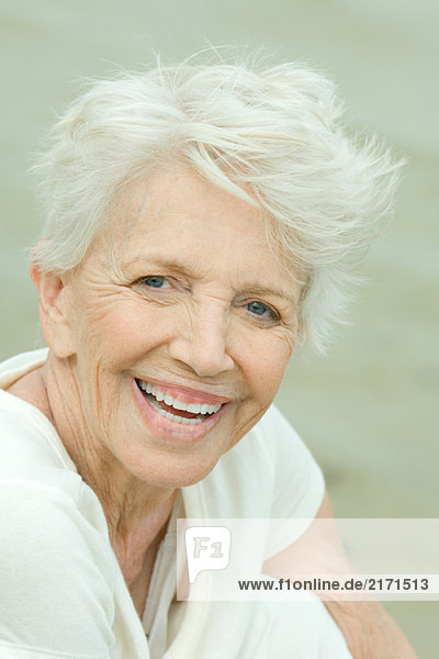 Senior woman  smiling at camera  portrait
