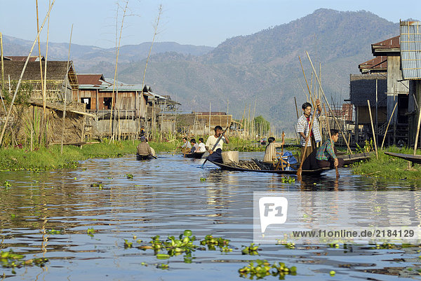 Group of people boating in river  Inle Lake  Myanmar