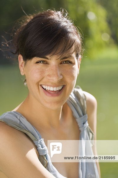 Woman smiling outdoors