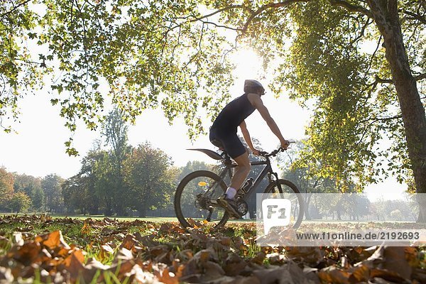 Cyclist riding mountain bike.