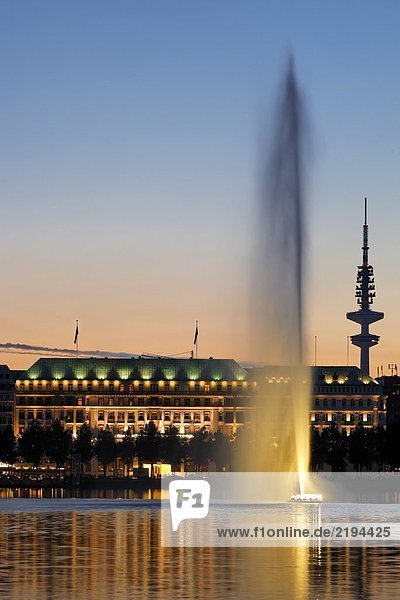 Fountain in lake  Hotel Vier Jahreszeiten  Heinrich-Hertz-Turm  Hamburg  Germany