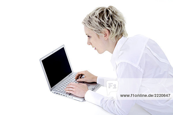 Young woman using Laptop  portrait