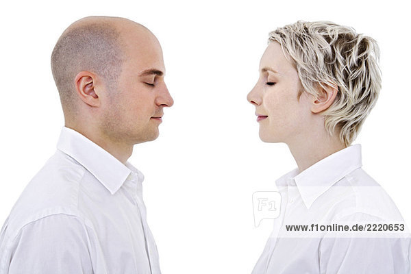 Young couple face to face  portrait