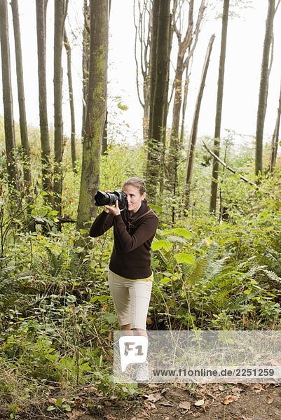 Frau nehmen photographie