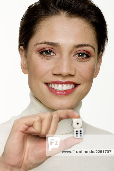 Woman holding dice