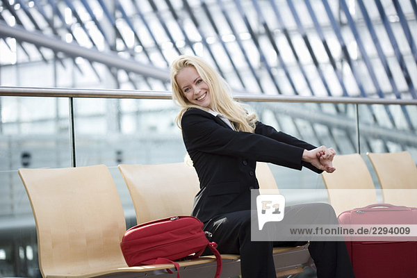 Business woman with luggage  portrait
