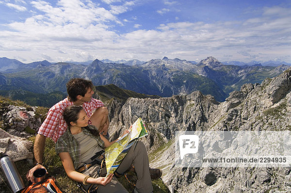 Austria  Salzburger Land  couple on mountain top  portrait