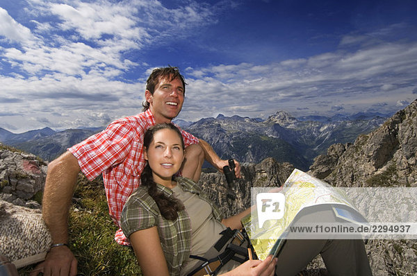 Austria  Salzburger Land  couple on mountain top  portrait