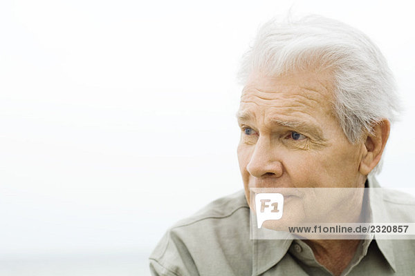 Senior man  looking away  portrait