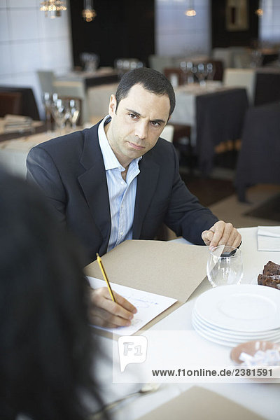 Business man in meeting in restaurant