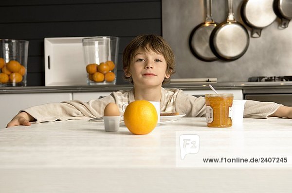 Portrait of a boy having breakfast