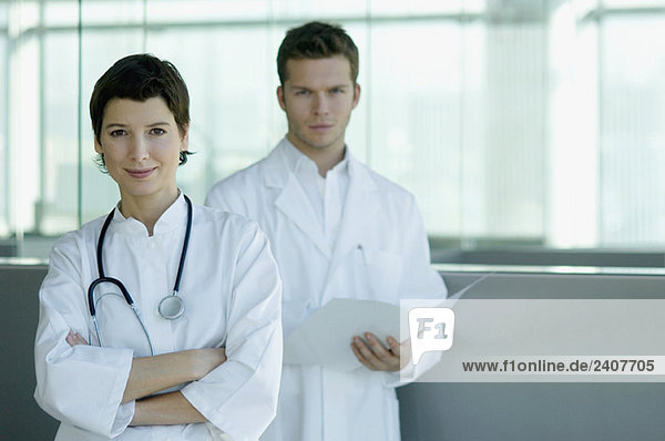 Portrait of a female and a male doctor standing together