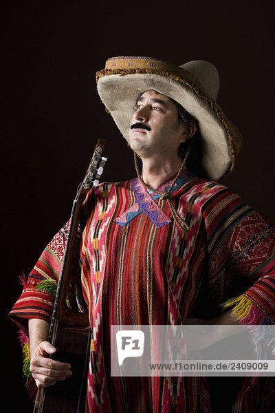 Stereotypischer Mexikaner mit Gitarre