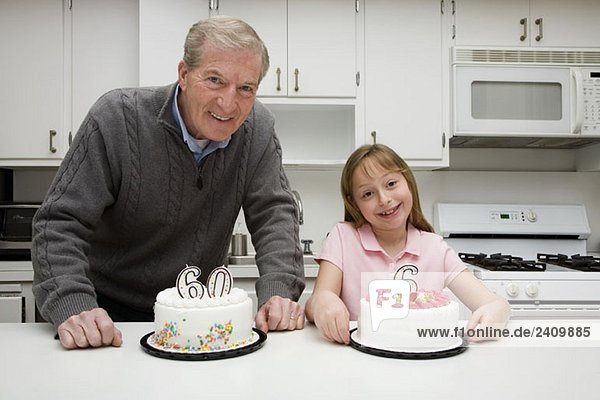 Grandfather celebrating a birthday with his granddaughter